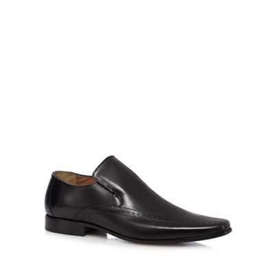 Black punched slip-on shoes